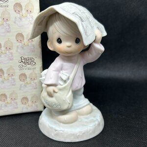 Precious Moments "Sending You Showers of Blessings" figurine